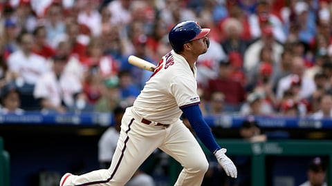 Philadelphia Phillies’ Rhys Hoskins watches his two-run home run off Minnesota Twins starting pitcher Jose Berrios in the baseball game on April 7, 2019.
