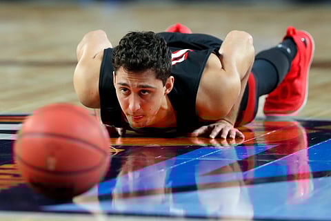 Texas Tech’s Davide Moretti warms up during a practice session