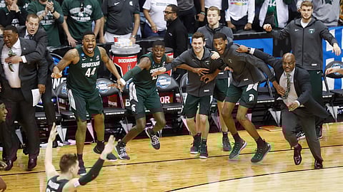 Michigan State players celebrate their win over Duke at the end of the NCAA men’s East Regional final in Washington, D.C., Sunday, March 31, 2019. (AP Photo}