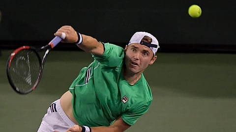Bjorn Fratangelo serves to Novak Djokovic, of Serbia, at the BNP Paribas Open tennis tournament Saturday, March 9, 2019, in Indian Wells, Calif.