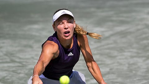 Caroline Wozniacki reaches for a shot at the Volvo Car Open, Thursday, April 4, 2019, in Charleston, S.C. (Grace Beahm Alford/The Post And Courier via AP)