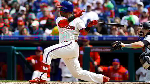 Phillies shortstop Jean Segura triples against the Marlins on April 28 (Matt Slocum)