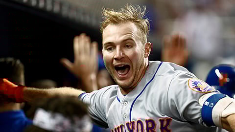 New York Mets’ Pete Alonso celebrates after hitting a three-run home run during the ninth inning against the Miami Marlins on April 1, 2019. It was Alonso’s first major league home run. 