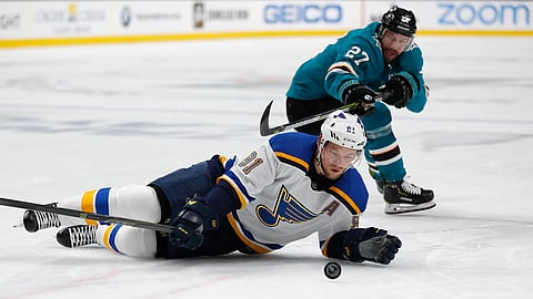 St. Louis Blues’ Vladimir Tarasenko (91) battles for the puck against San Jose Sharks’ Joonas Donskoi (27) in the second period in Game 1 of the NHL hockey Stanley Cup Western Conference finals in San Jose, Calif., on Saturday, May 11, 2019. (AP Photo/Josie Lepe)