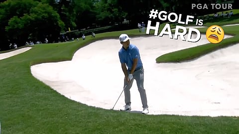 Xander Schaufeele has a hard time with the wind at Colonial during the Charles Schwab Challenge in Fort Worth