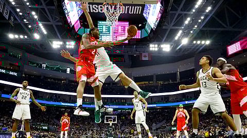 Toronto Raptors’ Kawhi Leonard shoots past Milwaukee Bucks’ Brook Lopez during the second half of Game 5 of the NBA Eastern Conference basketball playoff finals Thursday, May 23, 2019, in Milwaukee. The Raptors won 105-99 to take a 3-2 lead in the series. (AP Photo/Morry Gash)