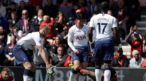 Tottenham’s Son Heung-Min, center, scuffles with Bournemouth’s Jefferson Lerma, on the ground, during the English Premier League soccer match between AFC Bournemouth and Tottenham Hotspur on May 4, 2019.