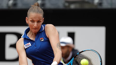 Karolina Pliskova, of the Czech Republic, returns a shot to Johanna Konta, of Britain during their final match at the Italian Open tennis tournament, in Rome, Sunday, May 19, 2019. 