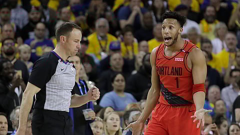 Portland Trail Blazers guard Evan Turner (1) gestures while talking to an official during the second half of Game 2 of the team’s NBA basketball playoffs Western Conference finals against the Golden State Warriors in Oakland, Calif., Thursday, May 16, 2019. (AP Photo/Jeff Chiu)