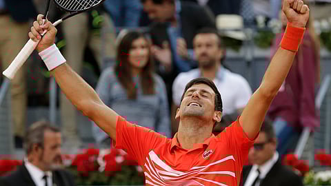 Serbia’s Novak Djokovic celebrates winning in two sets, 6-3, 6-4, against Greece’s Stefanos Tsitsipas in the final of the Madrid Open tennis tournament in Madrid, Spain, Sunday, May 12, 2019. (AP Photo/Bernat Armangue)
