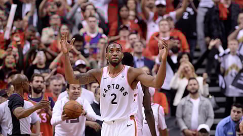 Toronto Raptors forward Kawhi Leonard reacts as following the Raptors win in Game 3 of the NBA basketball playoffs Eastern Conference finals in Toronto on May 19, 2019. 