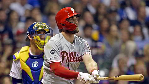 Follow Robert Mims’ advice, and keep your eye on the ball like Bryce Harper, and you can have some fun and make some money during baseball season. (AP Photo/Aaron Gash)