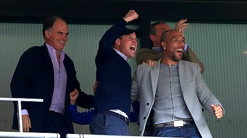 Britain’s Prince William, second left, and former footballer John Carew, right, celebrate after Aston Villa’s Anwar El Ghazi scores his side’s first goal of the game during the English Championship Play-off soccer final between Aston Villa and Derby County at Wembley Stadium, London, Monday, May 27, 2019. (Mike Egerton/PA via AP)