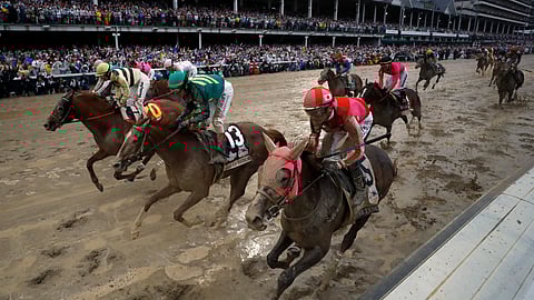 Flavien Prat ride Country House, left, to the finish line during the 145th running of the Kentucky Derby horse race at Churchill Downs on May 4, 2019, in Louisville, Ky. Country House was declared the winner after Maximum Security was disqualified following a review by race stewards.