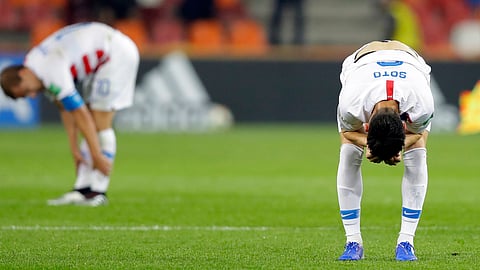 United States’ Sebastian Soto (right) eacts at the end of loss to Ukraine on May 24 (Sergei Grits)