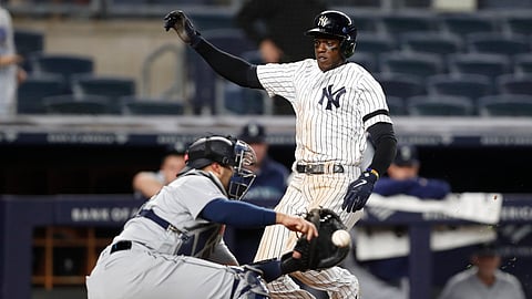 Yankees’ Cameron Maybin scores the winning run in the ninth inning May 7 against the Mariners (Kathy Willens)