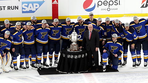 The Blues pose with the Clarence S. Campbell Bowl after winning the Western Conference Final on May 21 (Tom Gannam)