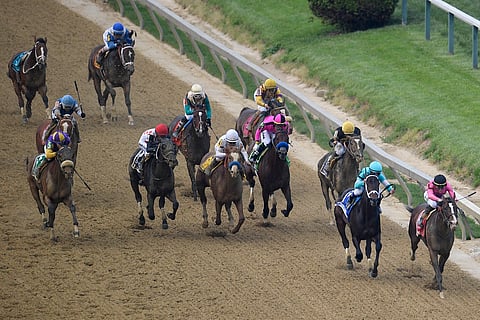 War of Will, ridden by Tyler Gaffalione, right, prepares to win the Preakness Stakes horse race at Pimlico Race Course, Saturday, May 18, 2019.