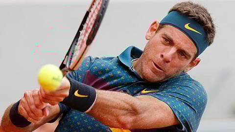 Argentina’s Juan Martin del Potro plays a shot against Japan’s Yoshihito Nishioka on May 30 (Christophe Ena )
