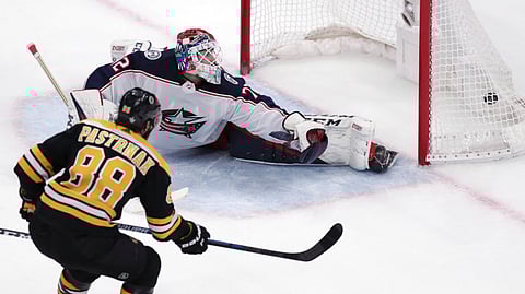 Boston Bruins right wing David Pastrnak (88) beats Columbus Blue Jackets goaltender Sergei Bobrovsky for a his second goal of an NHL hockey game during the third period of Game 5 of a second-round playoff series, Saturday, May 4, 2019, in Boston. (AP Photo/Charles Krupa)