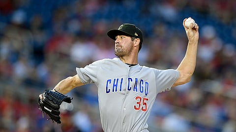 Chicago Cubs starting pitcher Cole Hamels delivers during the third inning of a baseball game against the Washington Nationals, Friday, May 17, 2019.