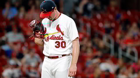 Cardinals pitcher Tyler Webb waits to be removed after allowing a bases-loaded walk to Atlanta’ Brian McCann on May 26 (Jeff Roberson)