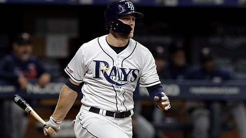 Tampa Bay’s Austin Meadows watches his three-run double against the Twins on May 30 (Chris O’Meara)
