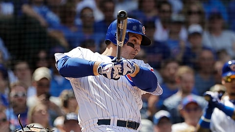 Chicago Cubs’ Anthony Rizzo hits a two-run double during the fourth inning of a baseball game against the Cincinnati Reds, Saturday, May 25, 2019, in Chicago. (AP Photo/Nam Y. Huh)