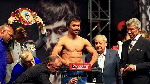 Manny Pacquiao weighing in at a previous fight.