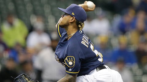Milwaukee’s Freddie Peralta allowed four runs in this first inning against the Rockies on May 2 (Jeffrey Phelps)