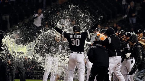 Chicago White Sox’s Nicky Delmonico is congratulated by teammates after hitting the game-winning three-run home run during the ninth inning of the team’s baseball game against the Boston Red Sox on May 2, 2019.