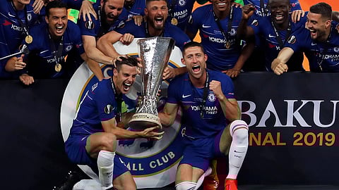 Chelsea players celebrate with the trophy after winning the Europa League Final soccer match between Chelsea and Arsenal at the Olympic stadium in Baku, Azerbaijan, Thursday, May 30, 2019. Chelsea won 4-1.