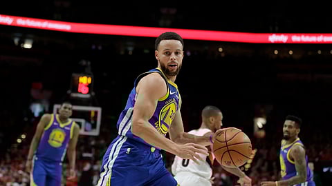 Golden State Warriors guard Stephen Curry (30) dribbles during the first half of Game 4 of the NBA basketball playoffs Western Conference finals against the Portland Trail Blazers, Monday, May 20, 2019, in Portland, Ore. (AP Photo/Ted S. Warren)