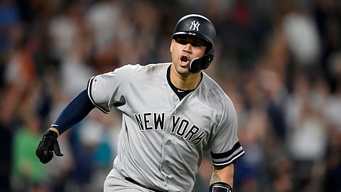 New York Yankees’ Gary Sanchez reacts as he heads to first to round the bases after hitting a three-run home run during the ninth inning of a baseball game against the Baltimore Orioles, Monday, May 20, 2019, in Baltimore. (AP Photo/Nick Wass)