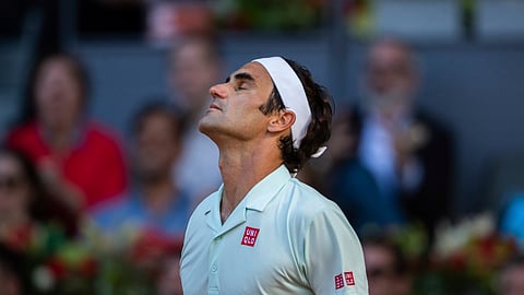 Roger Federer, from Switzerland, reacts after losing a point during the Madrid Open tennis match against Dominic Thiem, from Austria, in Madrid, Spain, Friday, May 10, 2019.