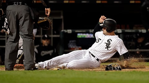 Chicago White Sox’s Adam Engel scores on a two-run single by Yonder Alonso during the ninth inning of the second game of a baseball doubleheader against the Baltimore Orioles on May 1, 2019.