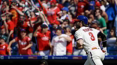 Philadelphia Phillies’ Bryce Harper runs to first after hitting a home run during the sixth inning of a baseball game on May 19, 2019.