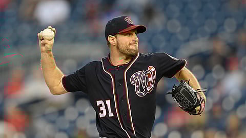Washington Nationals starting pitcher Max Scherzer throws against the St. Louis Cardinals, last week. This year he has not been an automatic W. (AP Photo/Nick Wass)