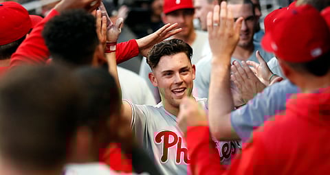 Phillies’ Scott Kingery is greeted in the dugout after hitting a solo home run in the fourth inning June 14 (John Bazemore)