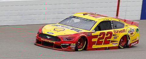 Joey Logano drives en route to securing the pole during qualifying on June 8 (Carlos Osorio)