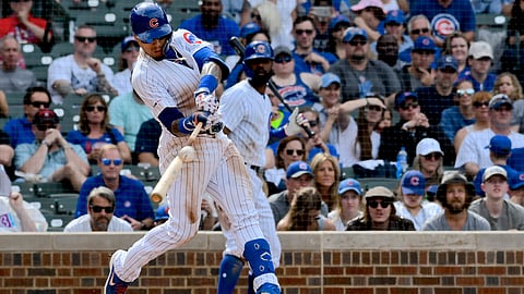 Cubs’ Javier Baez (9) hits a three run home run against the Mets on June 23 (Matt Marton)