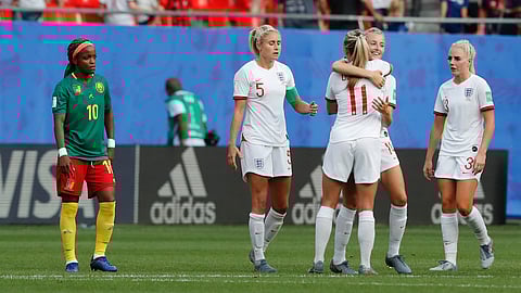 England players celebrate at the end of the Women’s World Cup round of 16 soccer match between England and Cameroon at the Stade du Hainaut stadium in Valenciennes, France, Sunday, June 23, 2019. England beat Cameroon 3-0. (AP Photo/Michel Spingler)