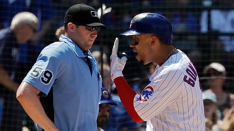 Cubs’ Carlos Gonzalez argues with home plate umpire Nic Lentz after being called out on strikes during the fourth inning on June 27 (Nam Y. Huh)