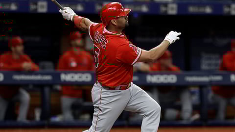 Angels’ Albert Pujols watches his two-run home run off the Rays’ Ryan Yarbrough on June 13 (Chris O’Meara)