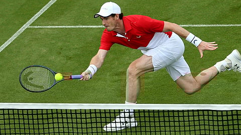 Andy Murray in men’s doubles action in the Nature Valley International on June 25 (Steven Paston/PA via AP)