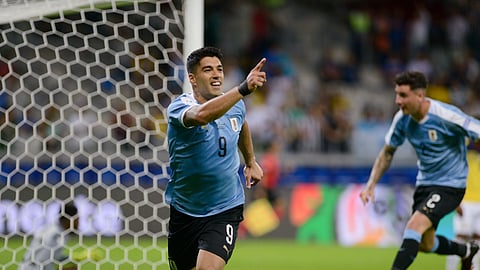 Uruguay’s Luis Suarez celebrates scoring his side’s third goal against Ecuador during a Copa America Group C soccer match at the Mineirao stadium in Belo Horizonte, Brazil, Sunday, June 16, 2019. (AP Photo/Eugenio Savio)