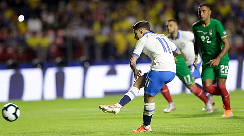 Brazil’s Phlippe Coutinho scores from the penalty spot his side’s opening goal June 14 (Andre Penner)