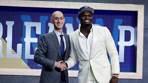Duke’s Zion Williamson, right, poses for photographs with NBA Commissioner Adam Silver after being selected by the New Orleans Pelicans as the first pick during the NBA basketball draft Thursday, June 20, 2019, in New York. (AP Photo/Julio Cortez)