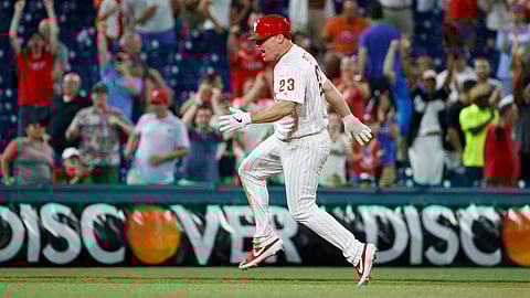 Phillies’ Jay Bruce celebrates after driving in the winning run with a double in the 10th inning on June 26 (Matt Slocum)