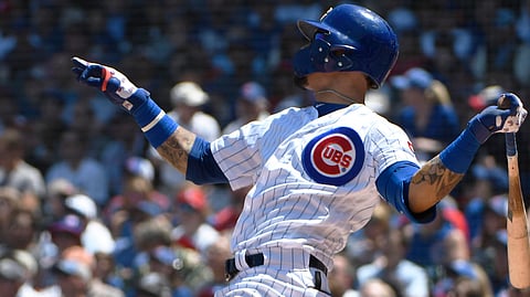 Cubs’ Javier Baez hits a two run home run against the Cardinals on June 7 (David Banks)